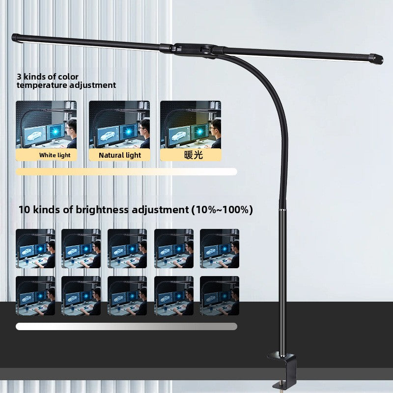 Dual head desk lamp providing wide coverage for home office and dual monitor setup