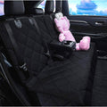Black car seat cover with a pink plush toy on a car seat