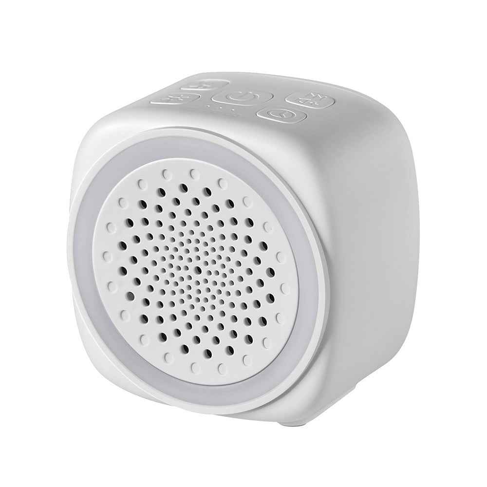 Compact white noise machine showing travel-friendly size for hotels and trips