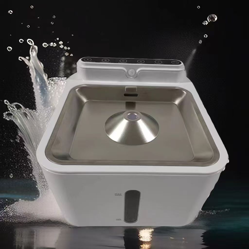 Modern pet water fountain with water splashing around it on a dark background